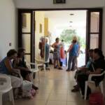 Village ladies catching up on the local news whilst enjoying the cool breeze in the shade.