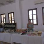 Anna with her mosaics and gifts